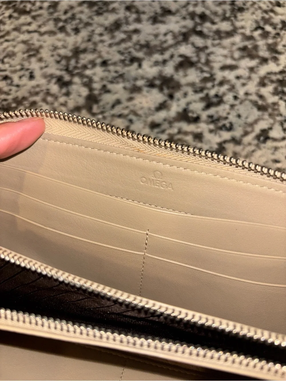 Omega boutique monogrammed